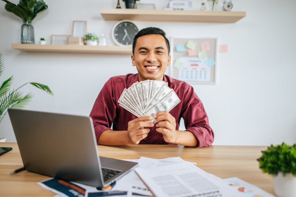 man holding money