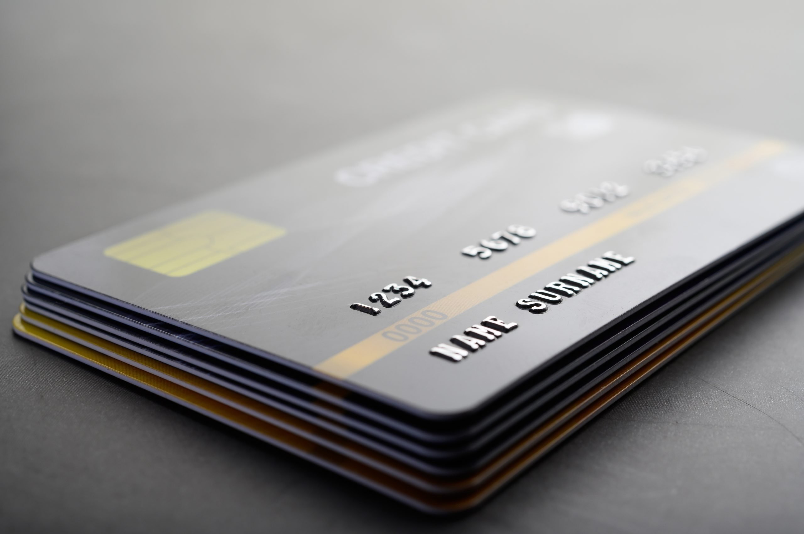 Credit cards that are stacked neatly together,selective focus