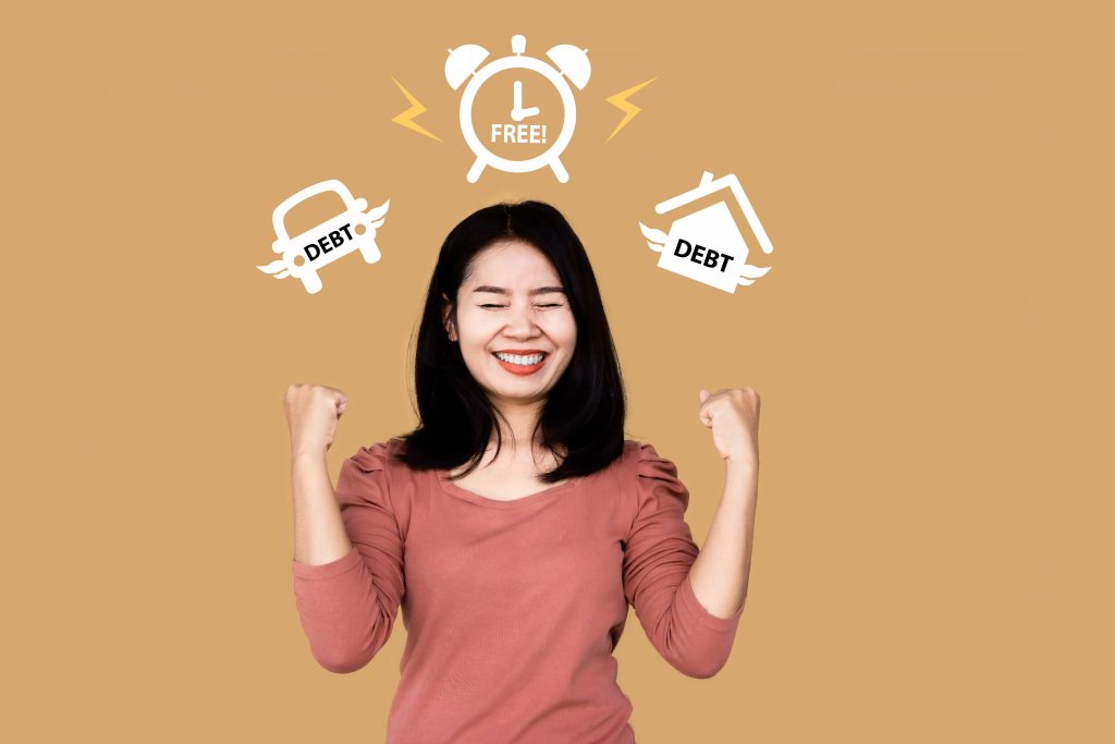 debt freedom concept with happy Asian woman celebrating her succ