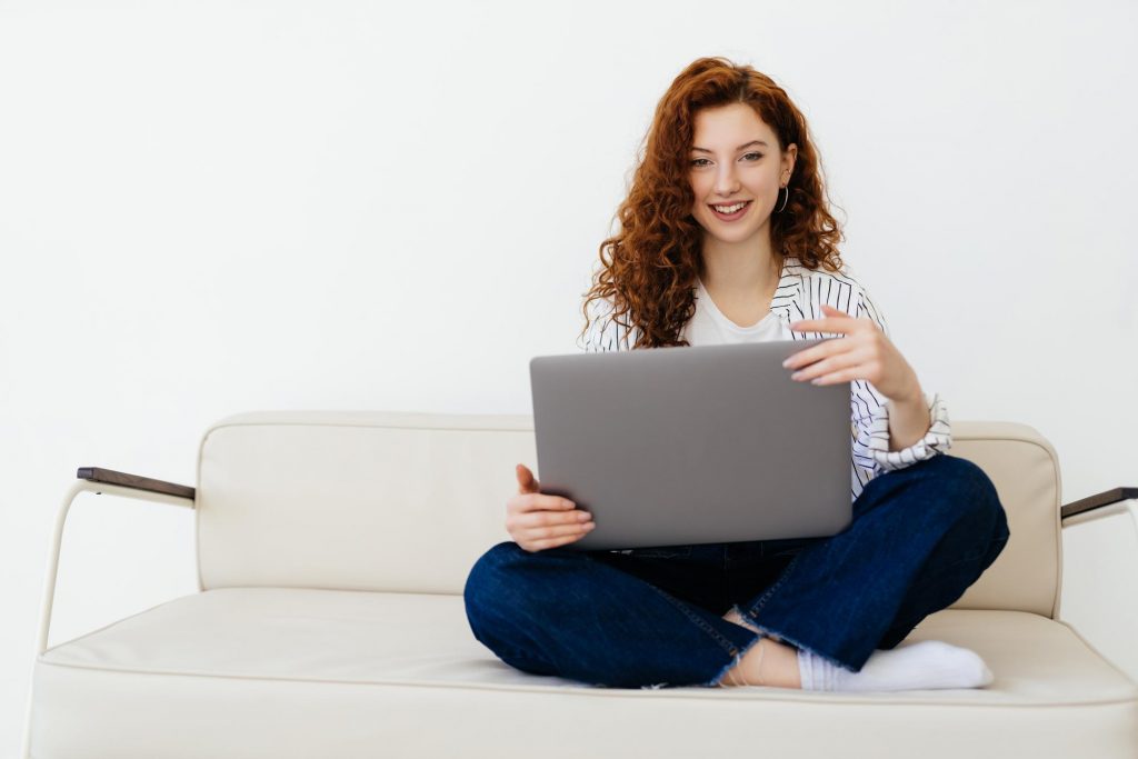woman using notebook laptop working online