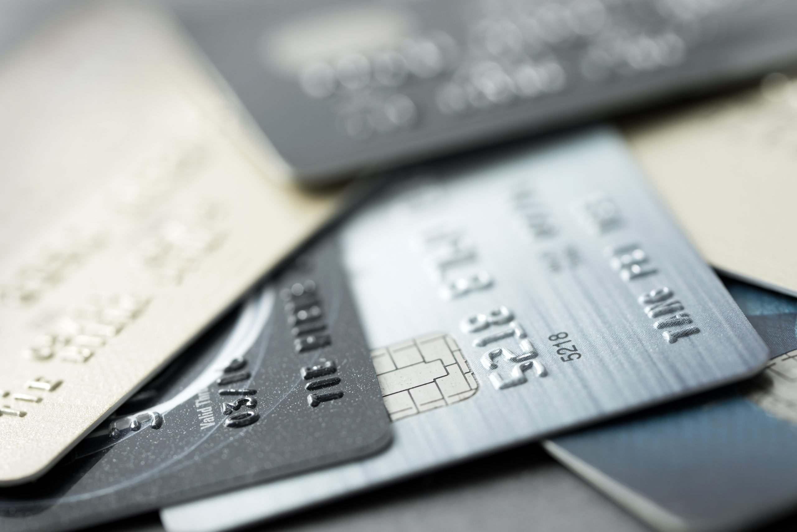 Close up of credit cards forming background