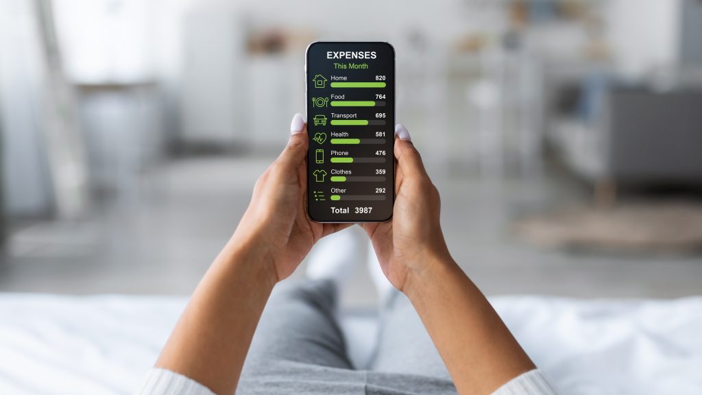 Afro american lady with cellphone relaxing on bed at home, calculating monthly spendings, checking expenses by categories, planning family budget, using mobile app, collage, panorama with copy space