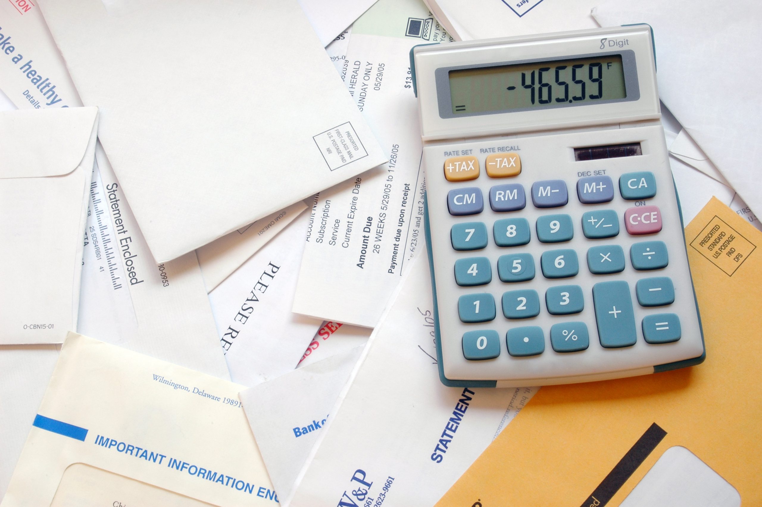 calculator on top of papers