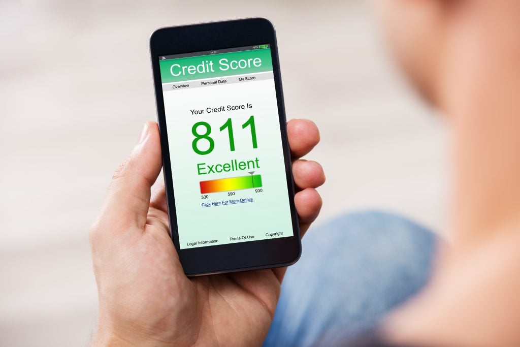 Smart Phone Showing Credit Score On A Screen