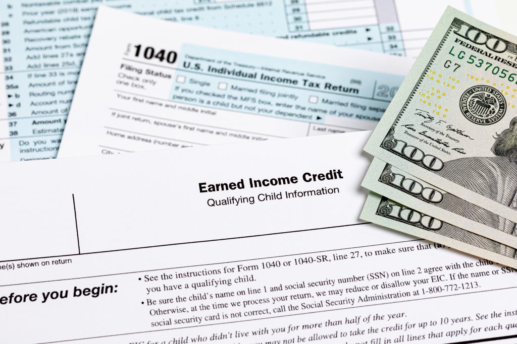 Earned income tax credit form. Tax credit, deduction and tax ret