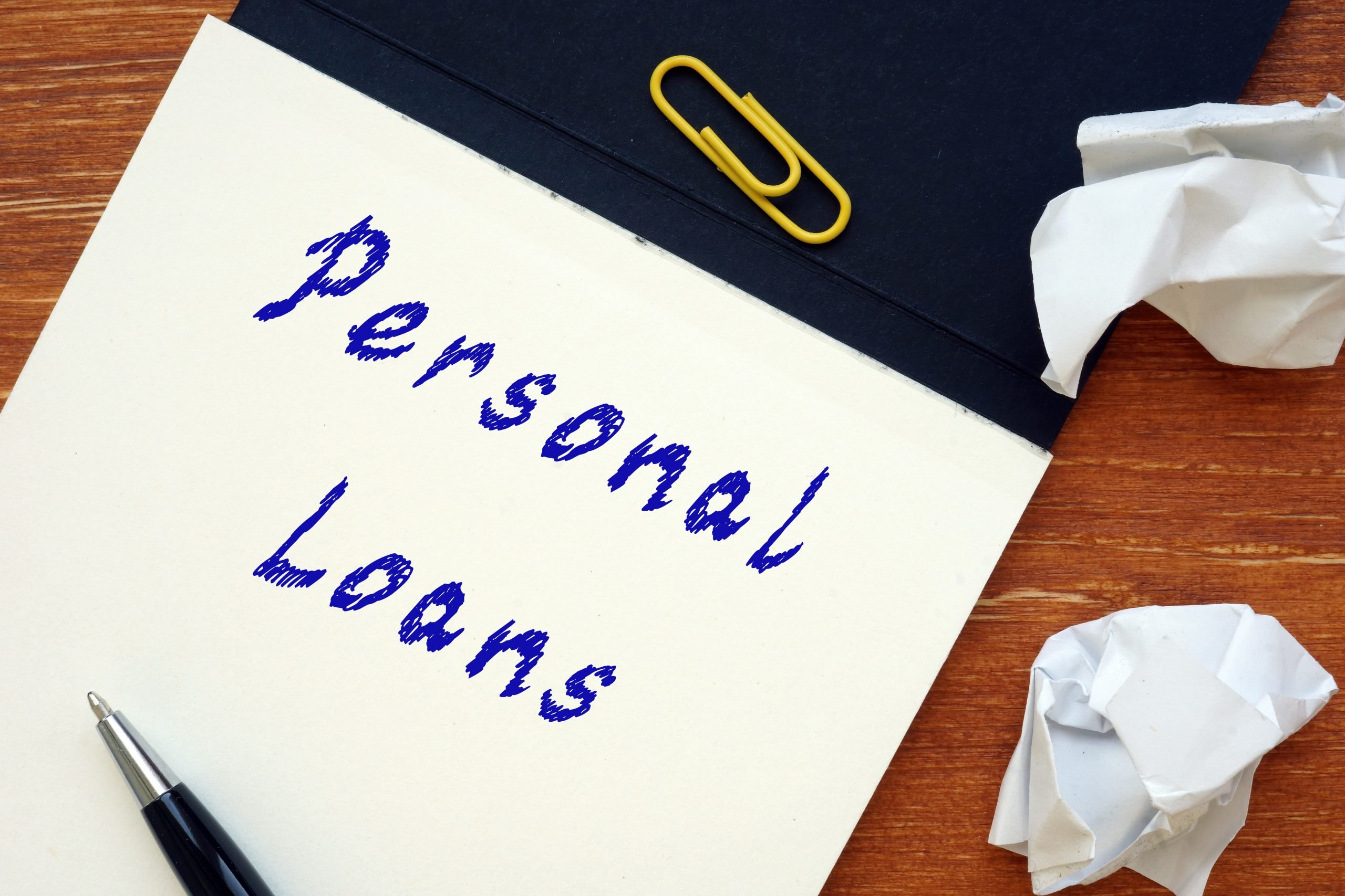 Business concept about Personal Loans with phrase on the page.