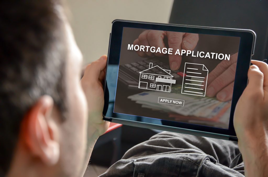 Online mortgage concept on a tablet