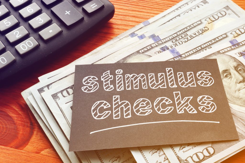 Coronavirus stimulus checks are shown on the photo