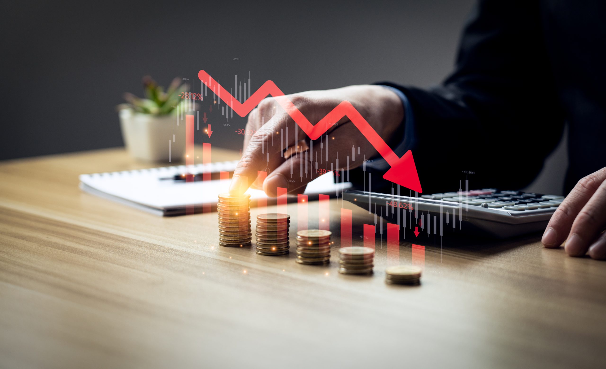 Economic collapse concept, businessman with falling financial graph chart due to global recession. Stock market crash, inflation, financial crisis, Falling income in GDP, capital reduction