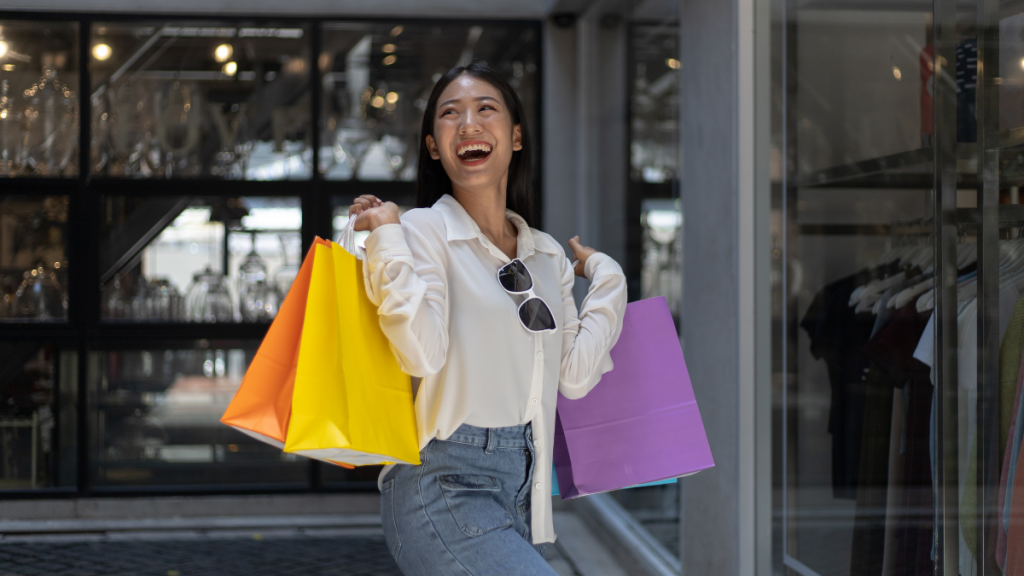 asian woman with shopping bags
